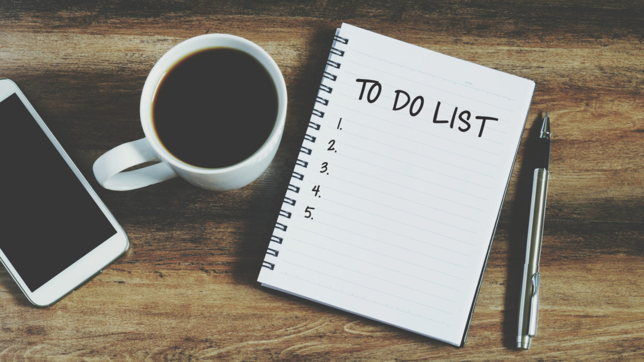 Smart phone, coffee, pen and notepad with text " to do list", retro style