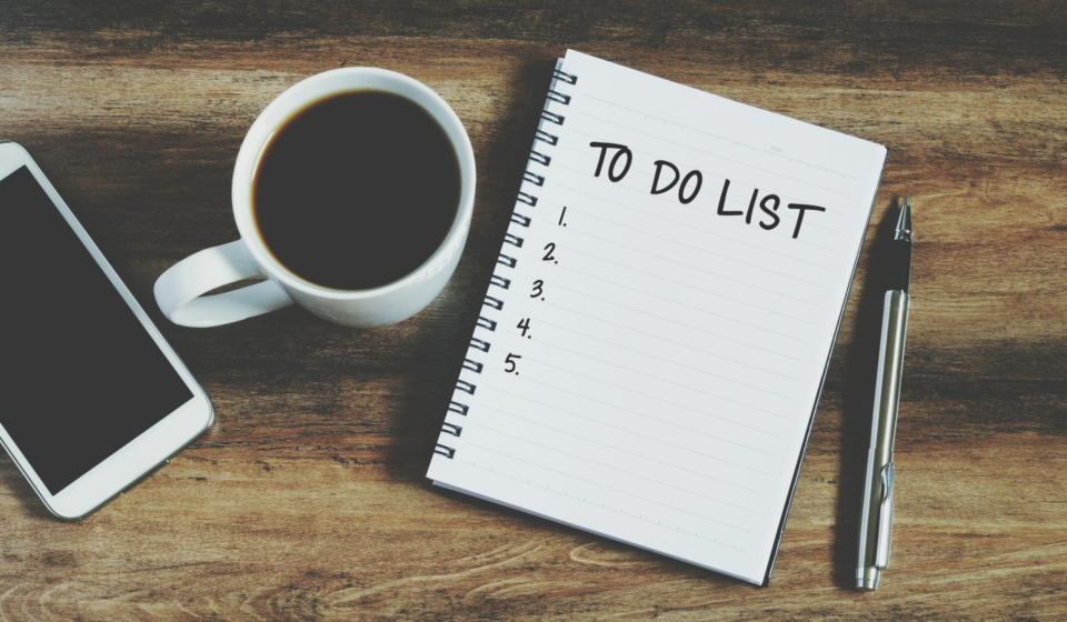 Smart phone, coffee, pen and notepad with text " to do list", retro style
