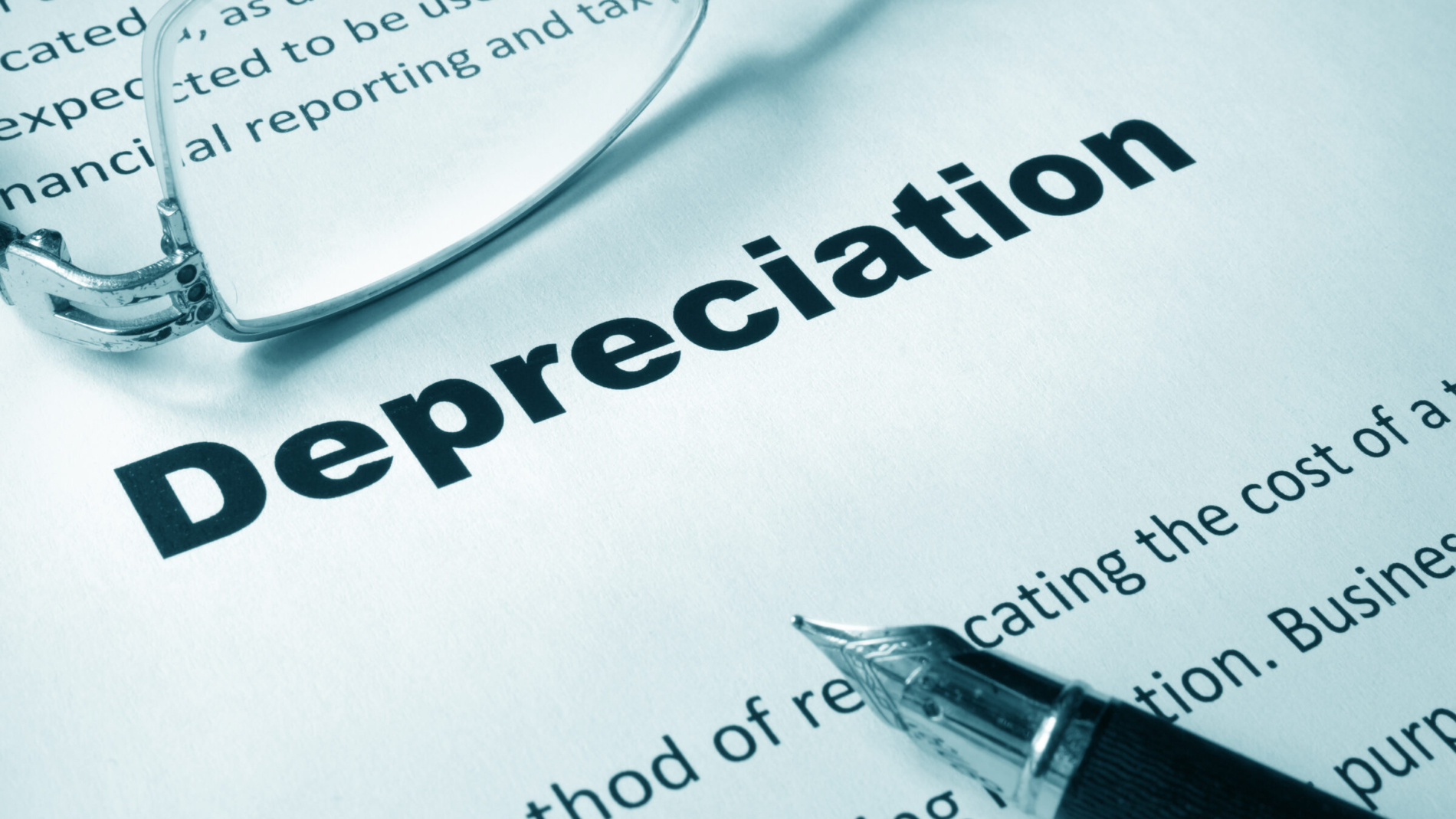 Paper with sign Depreciation and a pen. Business concept.
