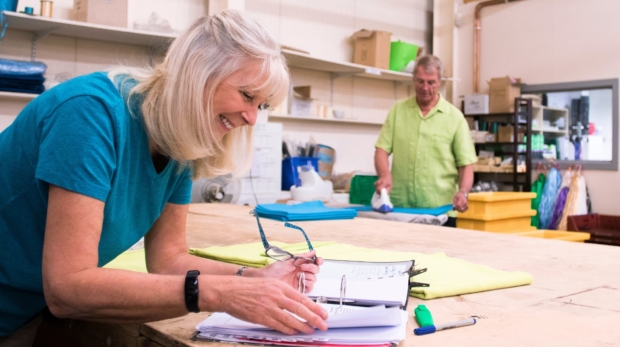 Businesswoman Doing Stock Paperwork