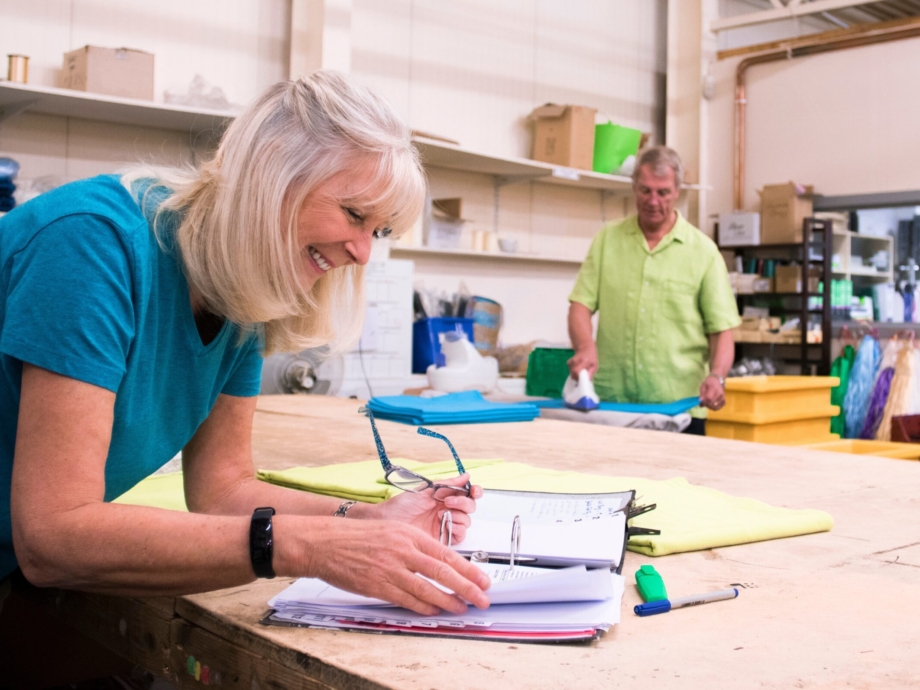 Businesswoman Doing Stock Paperwork
