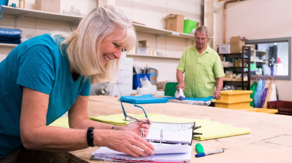 Businesswoman Doing Stock Paperwork